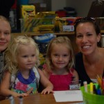 Kayley at her table in kindergarten